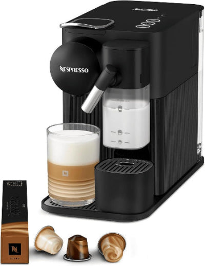 Black Nespresso coffee machine with a glass of coffee and capsules on a white background