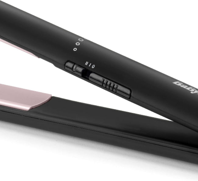 Black hair straightener with pink accent on a white background