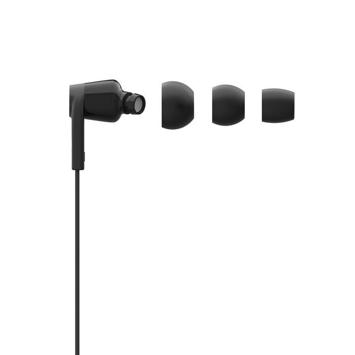Black in-ear headphones with three different size earbuds on a white background