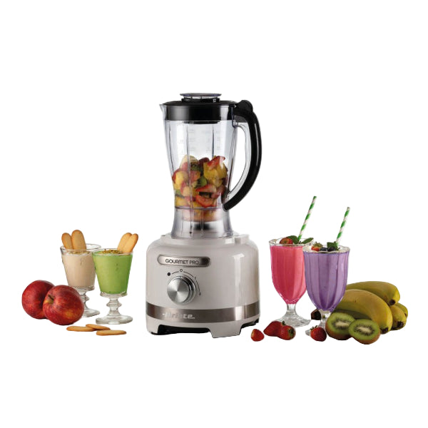 Blender with fruits and smoothies on a white background