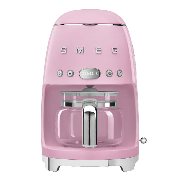 Pink Smeg coffee machine on a white background