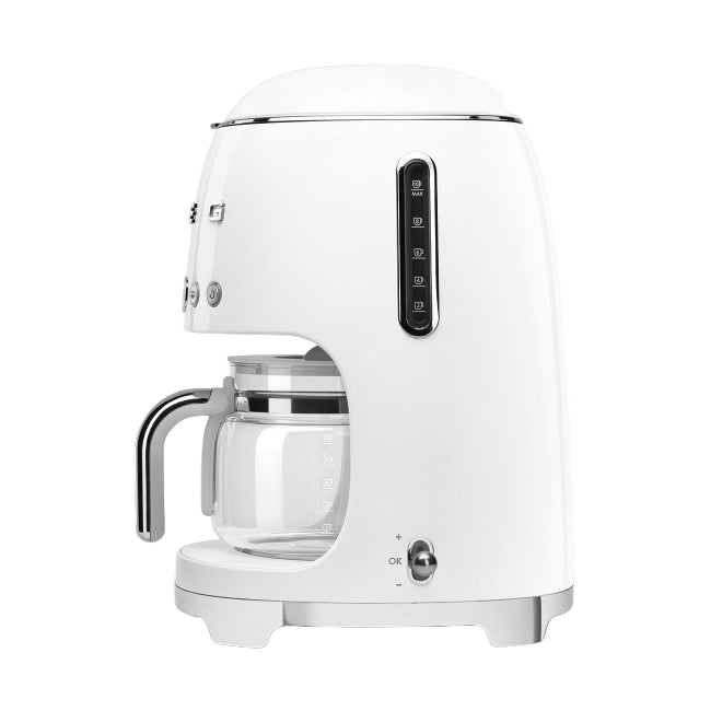 White coffee machine with glass carafe on a white background