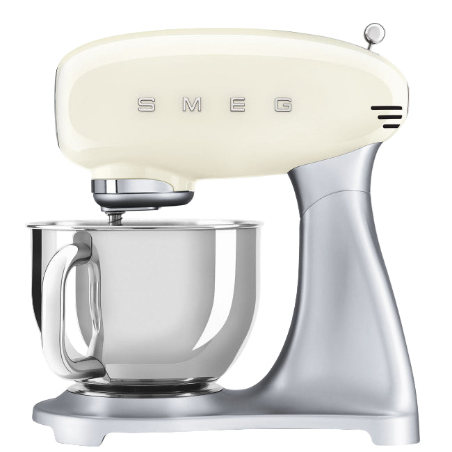 Cream-colored Smeg stand mixer on a white background