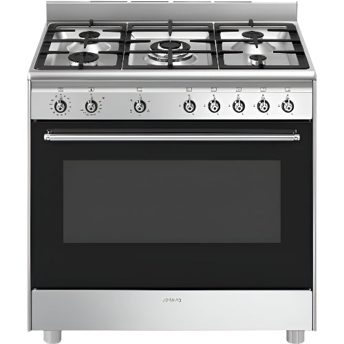 Stainless steel gas cooker with five burners on a white background