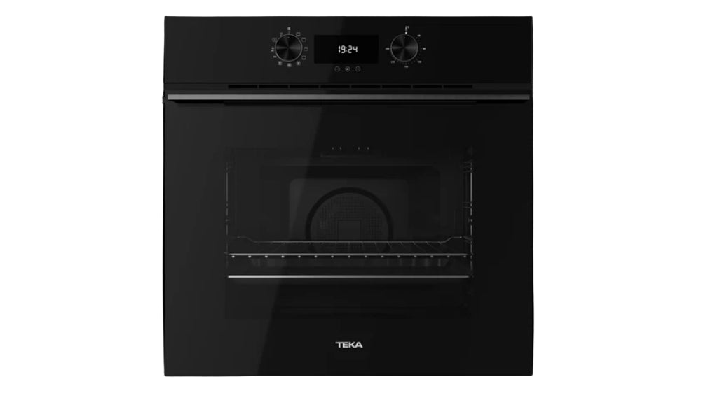 Black Teka oven on a white background