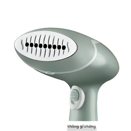 Green handheld steamer on a white background