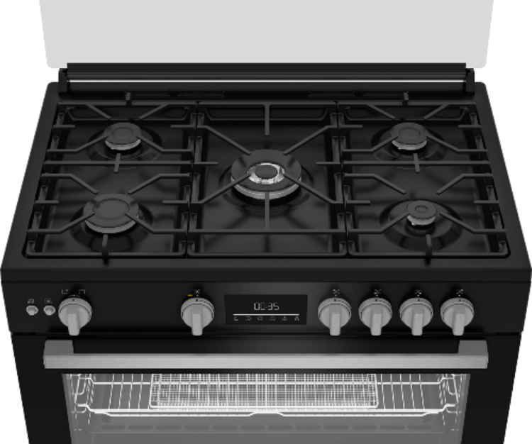 Black gas stove with four burners and an oven on a white background