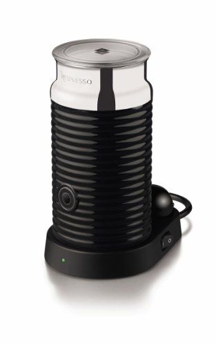 Black milk frother with glass container on a white background