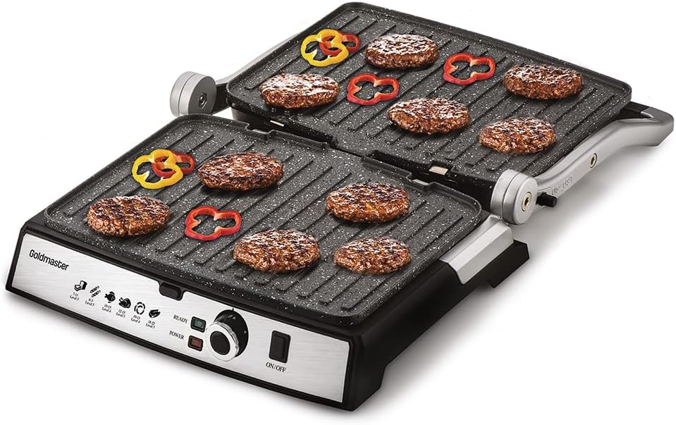Double grill pan with food items on a white background