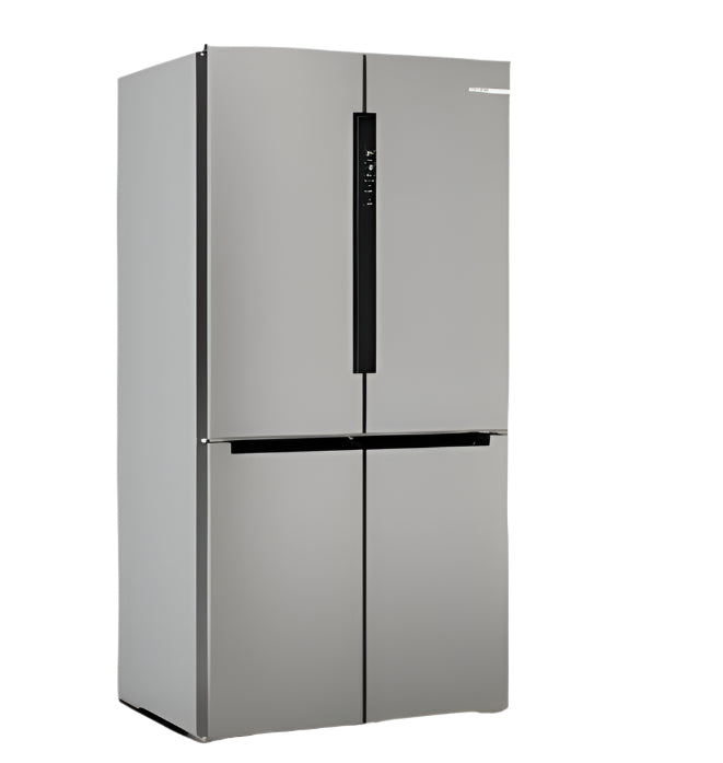 Silver refrigerator in a room with light green walls and a plant.