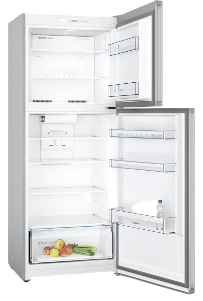 Open refrigerator with fresh fruits and vegetables inside on a white background