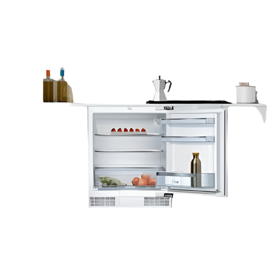 Undercounter refrigerator in a modern kitchen setting with white cabinets and marble countertop.