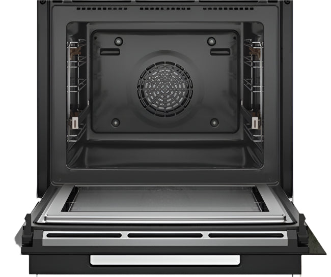 Black oven with open door in a kitchen setting