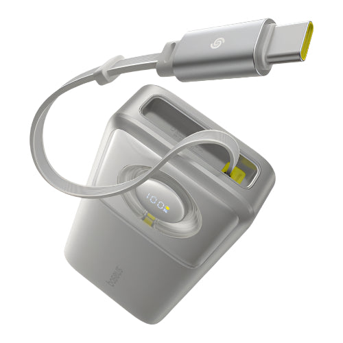 Gray electronic device with a cable attached on a white background