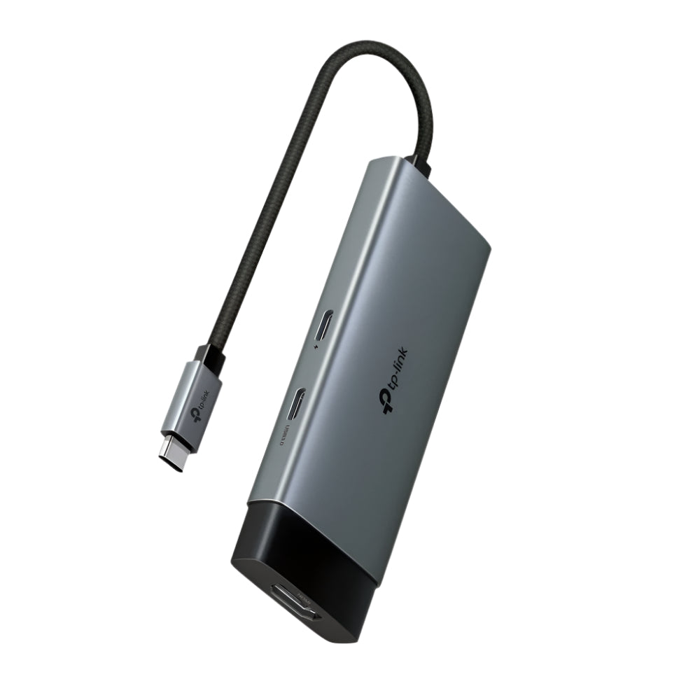 Tp-link USB Type-C 5 in 1 Hub in gray color with multiple ports and a cable attached.