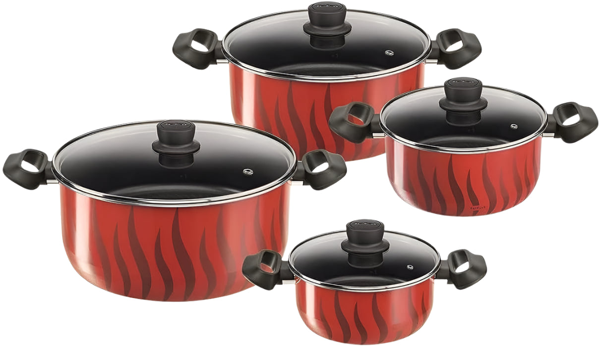 Set of red cookware with black handles and lids on a white background