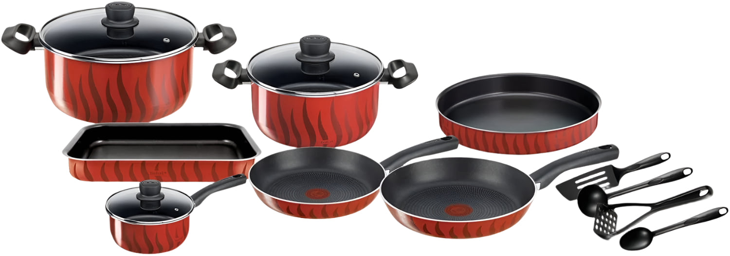 Set of red cookware with black handles on a white background
