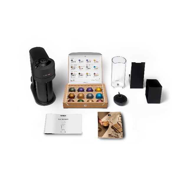 Nespresso Vertuo coffee machine and accessories on a white background