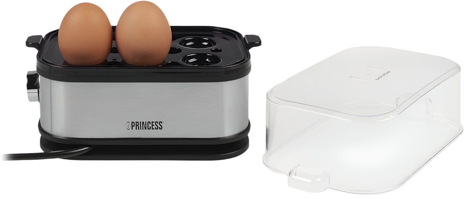 Egg cooker with two eggs inside, next to a white container, on a light background.