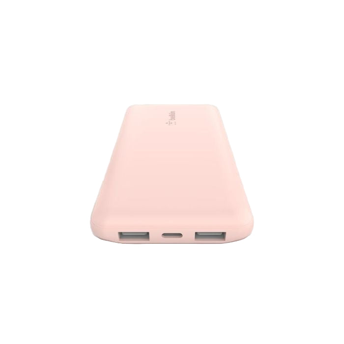Pink power bank on a gray background
