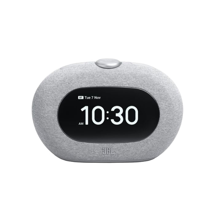 Gray digital clock with a screen displaying time and date on a white background