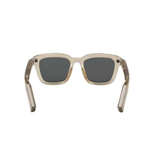 Sunglasses with beige frame and dark lenses on a white background