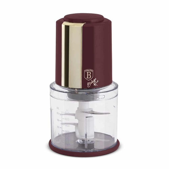 Bosch food processor with maroon base and clear container on a white background