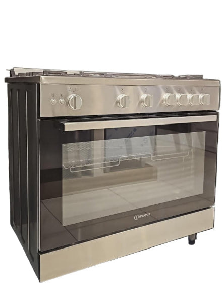 Stainless steel gas stove with oven in a showroom setting