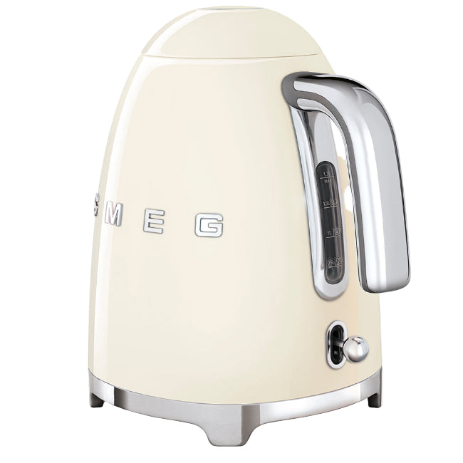 Cream-colored kettle with chrome accents on a white background