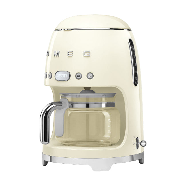 Cream-colored coffee machine with Smeg logo on a white background