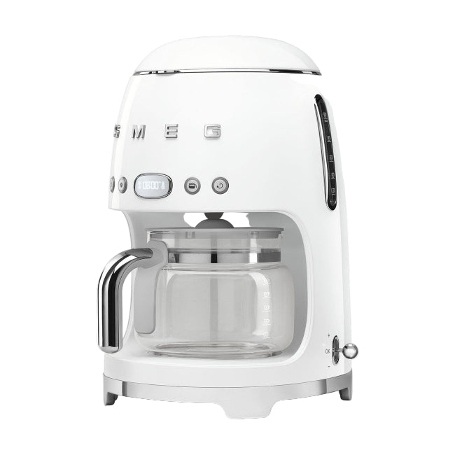 White coffee machine with glass carafe on a white background