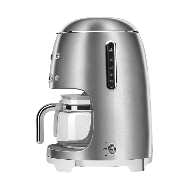 Silver coffee machine with glass carafe on a white background