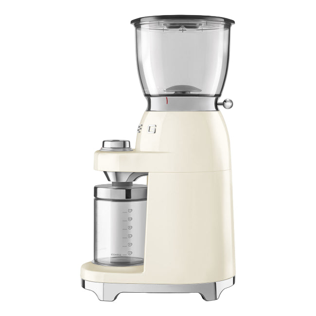 Cream-colored coffee grinder on a white background