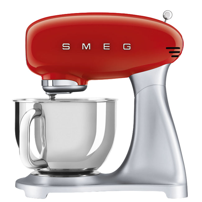 Red Smeg stand mixer with a clear mixing bowl on a white background