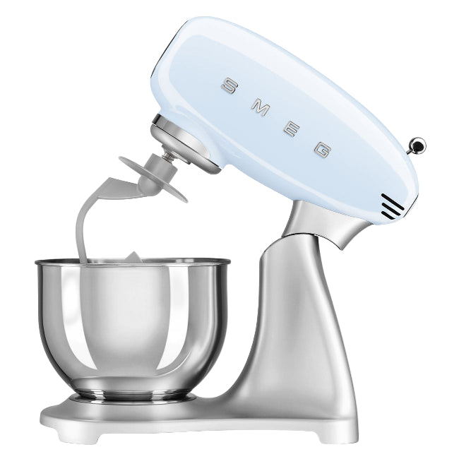 Light blue stand mixer with clear bowl on a white background