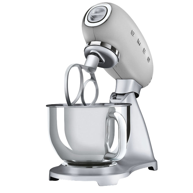 Silver stand mixer with clear bowl on a white background