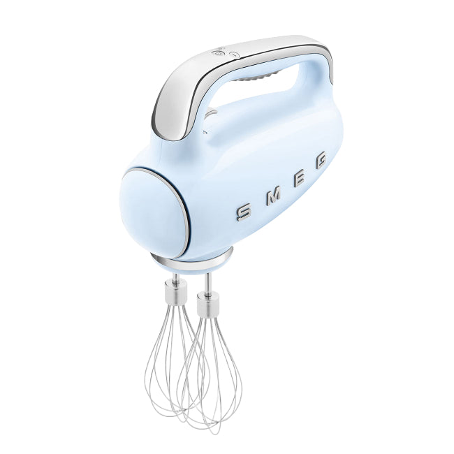 Light blue hand mixer with whisk attachment on a white background