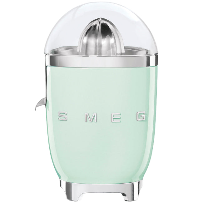 Mint green citrus juicer with silver top on a white background