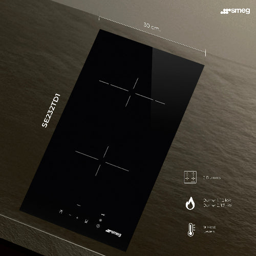 Black induction cooktop with Smeg branding on a dark surface