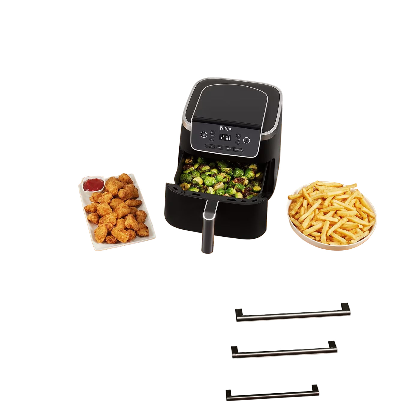 Black air fryer on a wooden countertop with various foods around it.