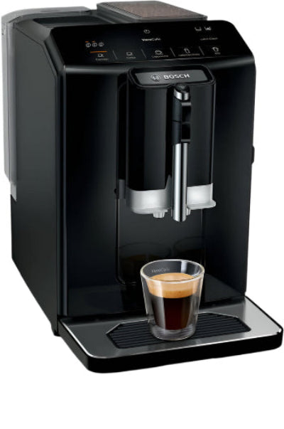 Black Bosch coffee machine with a glass of coffee on a white background