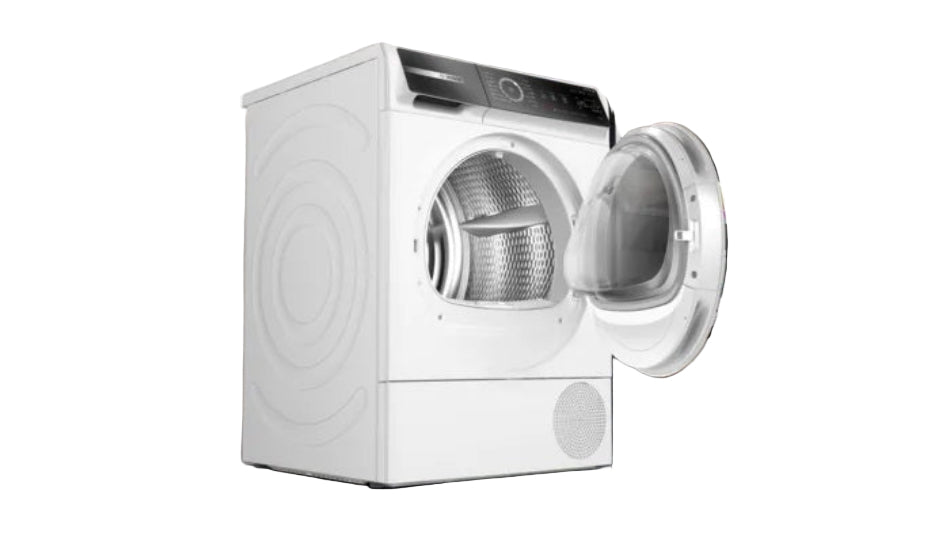 White dryer in a laundry room with colorful clothes on a rack.