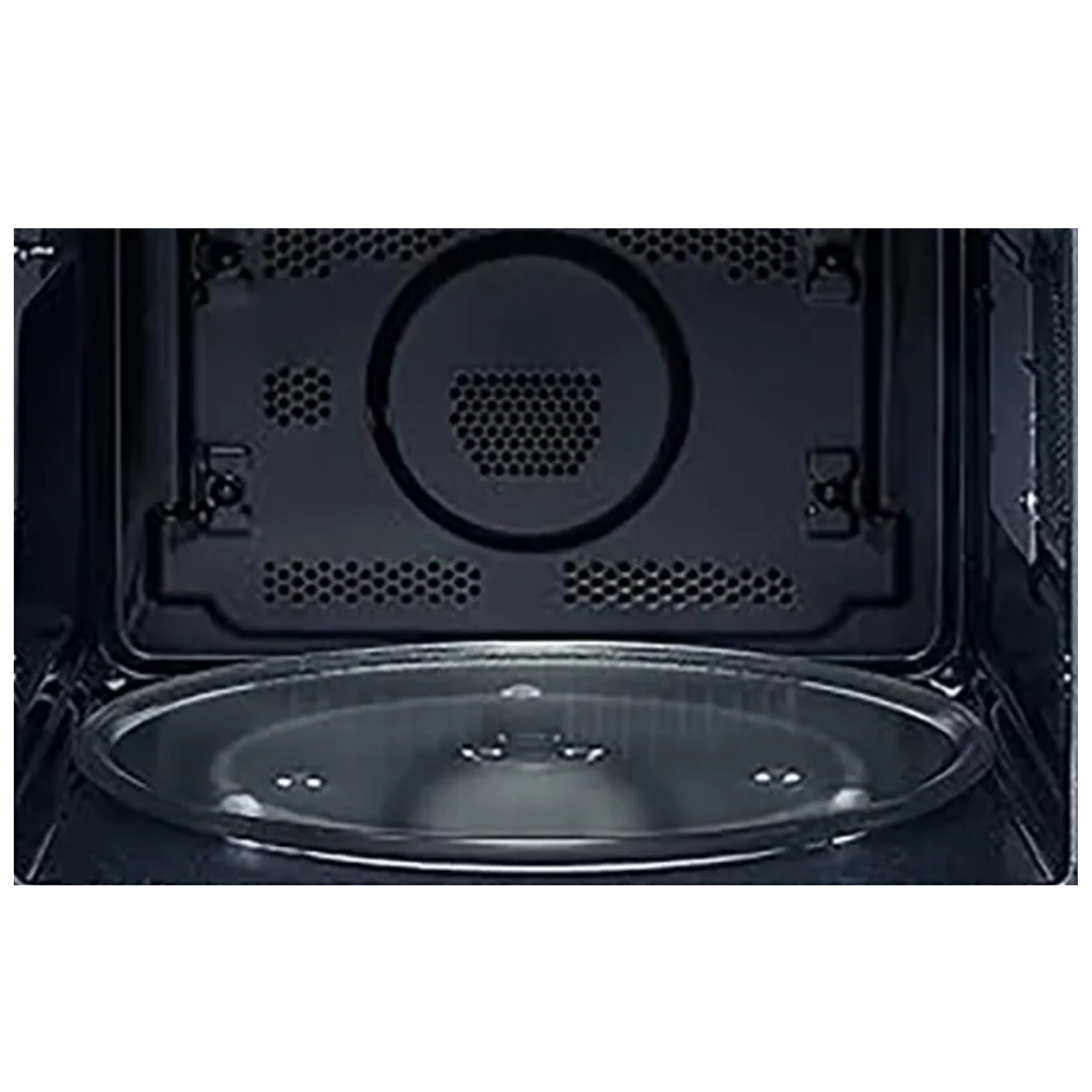 Interior of a microwave oven with a turntable and black interior.