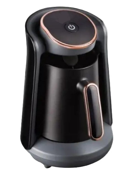 Black and rose gold coffee maker on a white background