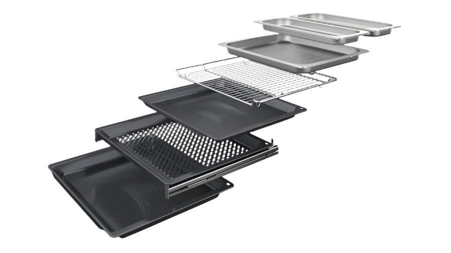 Set of various baking trays and pans on a white background
