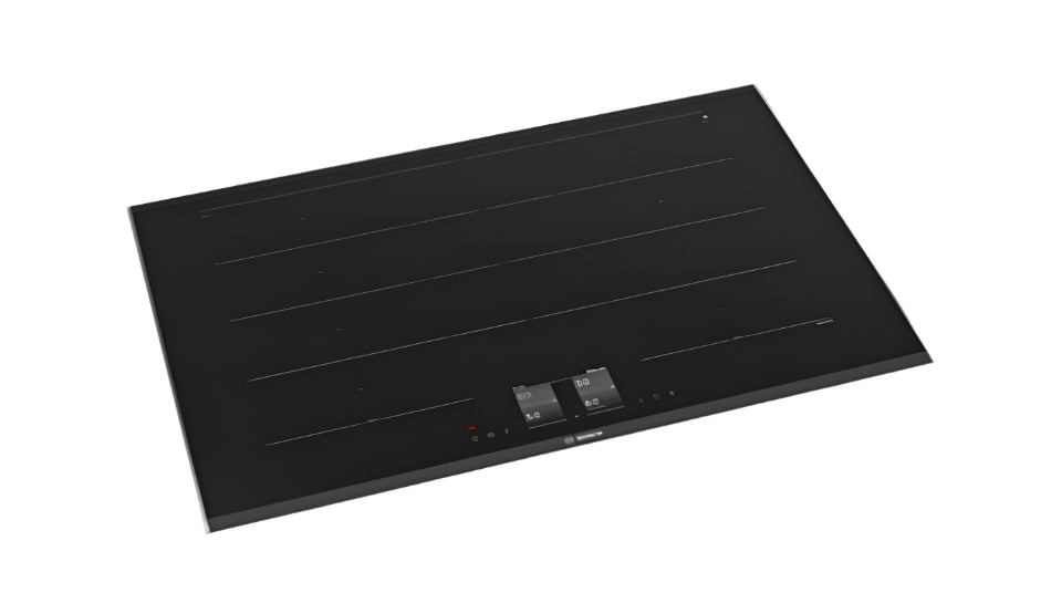 Black induction cooktop on a white kitchen countertop