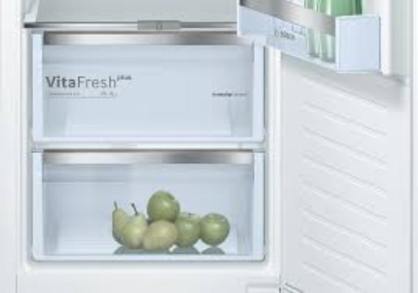VitaFresh refrigerator with green apples inside, brand visible