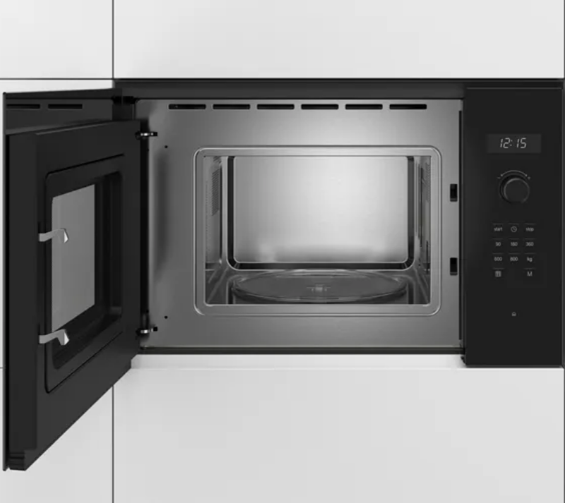Black microwave oven with open door on a white kitchen counter