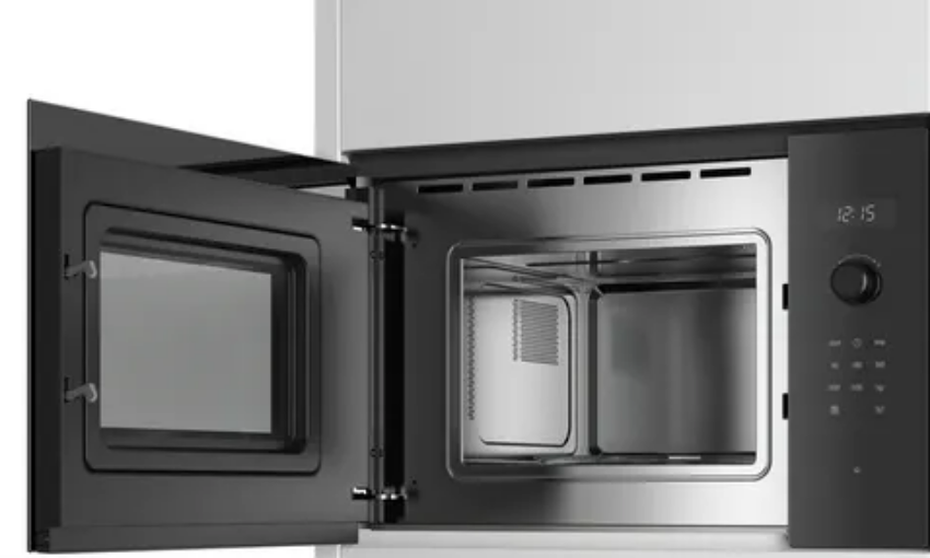 Stainless steel oven with open door showing interior