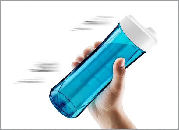 Hand holding a blue water bottle with a white cap against a white background